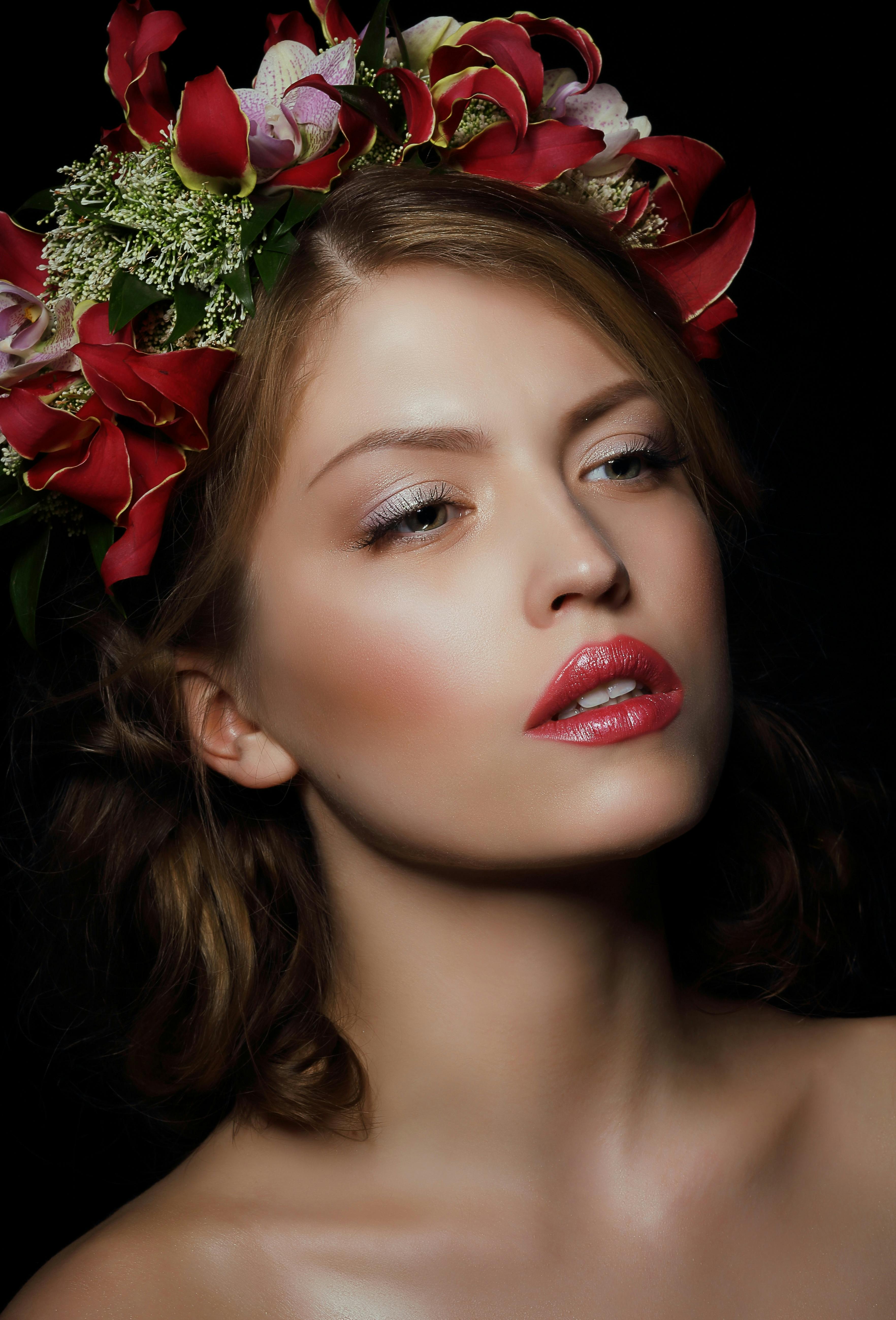 woman wearing red floral headdress