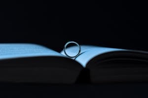 Silver Ring on Book Page