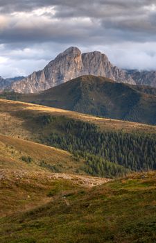 Breathtaking view of the Dolomites in Italy with a sunset glow over the landscape.