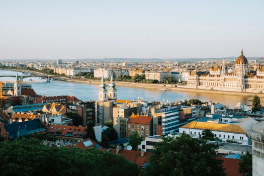 A stunning cityscape of Budapest with the Hungarian Parliament and Danube River viewed from above.