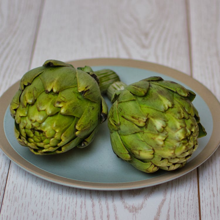 Green Artichoke on Gray Round Plate