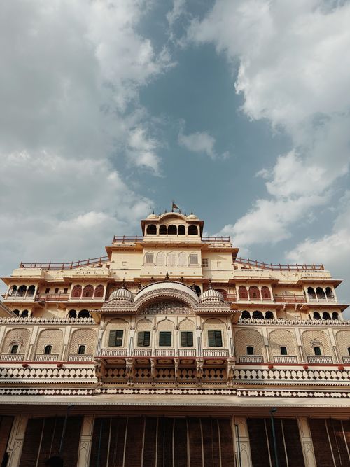 Free A stunning architectural marvel, the City Palace in Jaipur under a vibrant sky. Stock Photo