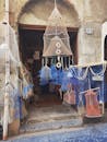 Rustic Shop Entrance with Colorful Hanging Nets