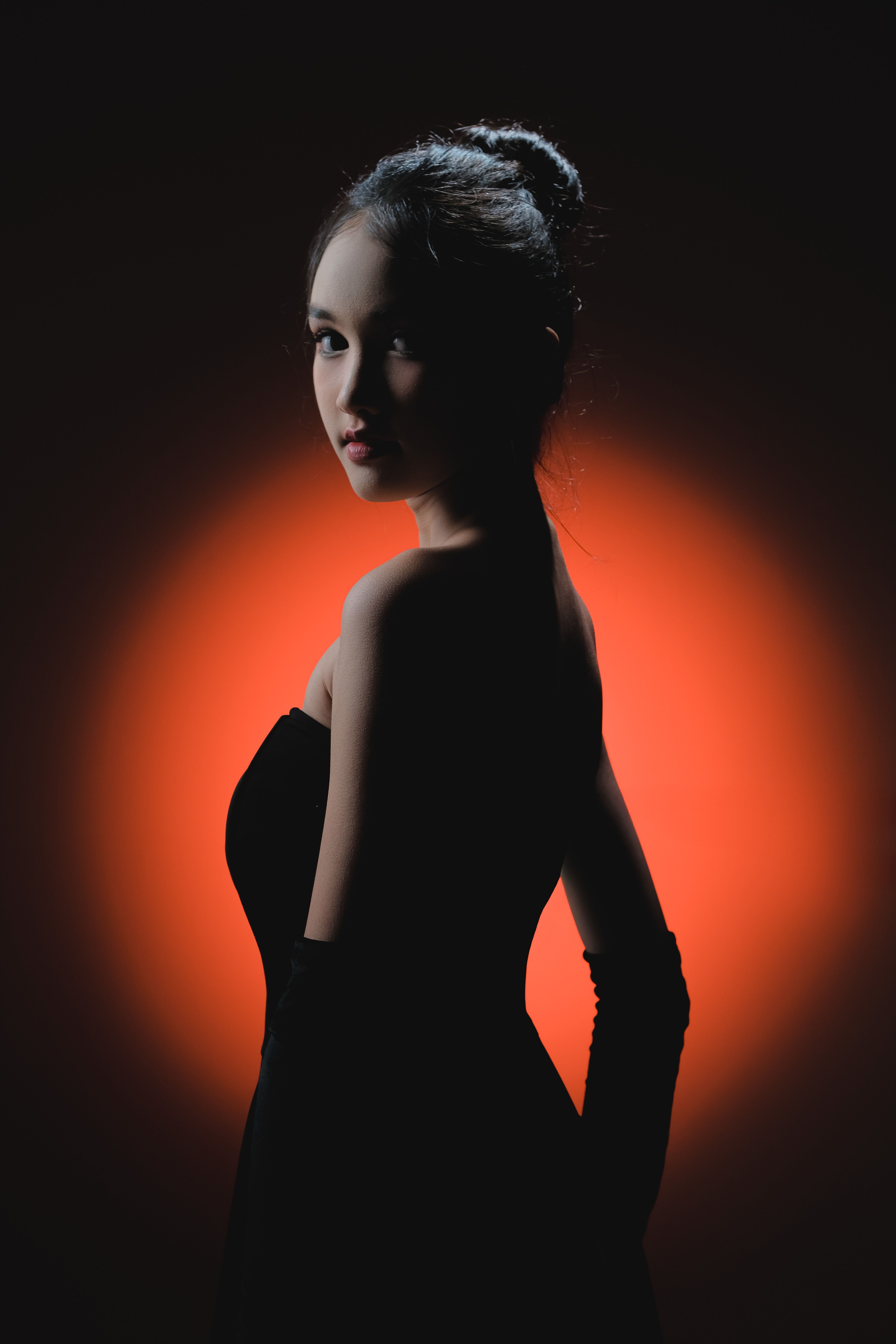 Elegant Portrait of a Woman in Dramatic Lighting · Free Stock Photo
