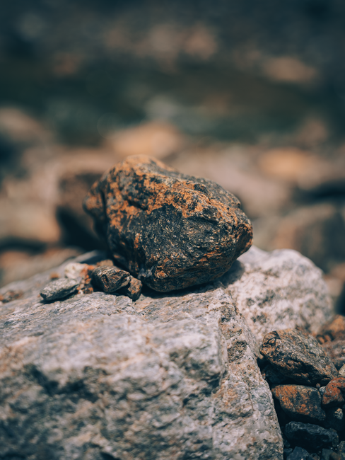 Detailed view of textured rocks in Khourfakkan, UAE mountains, showcasing natural beauty. - Customer Reviews and Testimonials on Shilajit Products