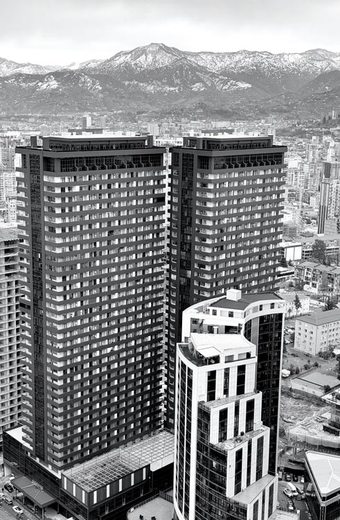 High Rise Front View Aerial View of Modern High-Rise Buildings · Free Stock Photo