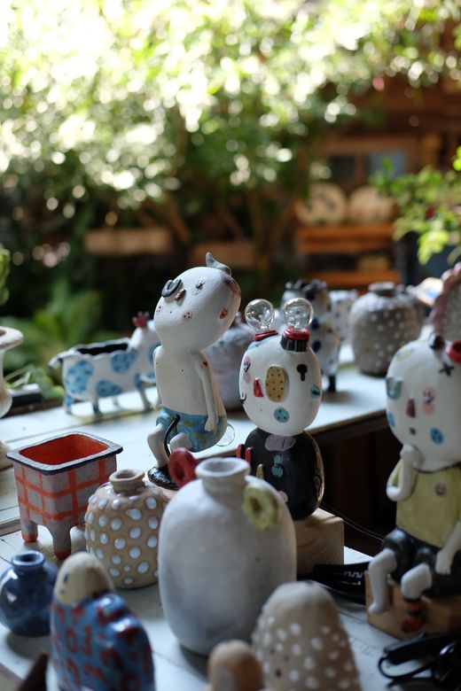Unfired pottery on a studio bench, Nam Nguyen on Pexels