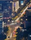 Aerial Night View of a Bustling City Intersection