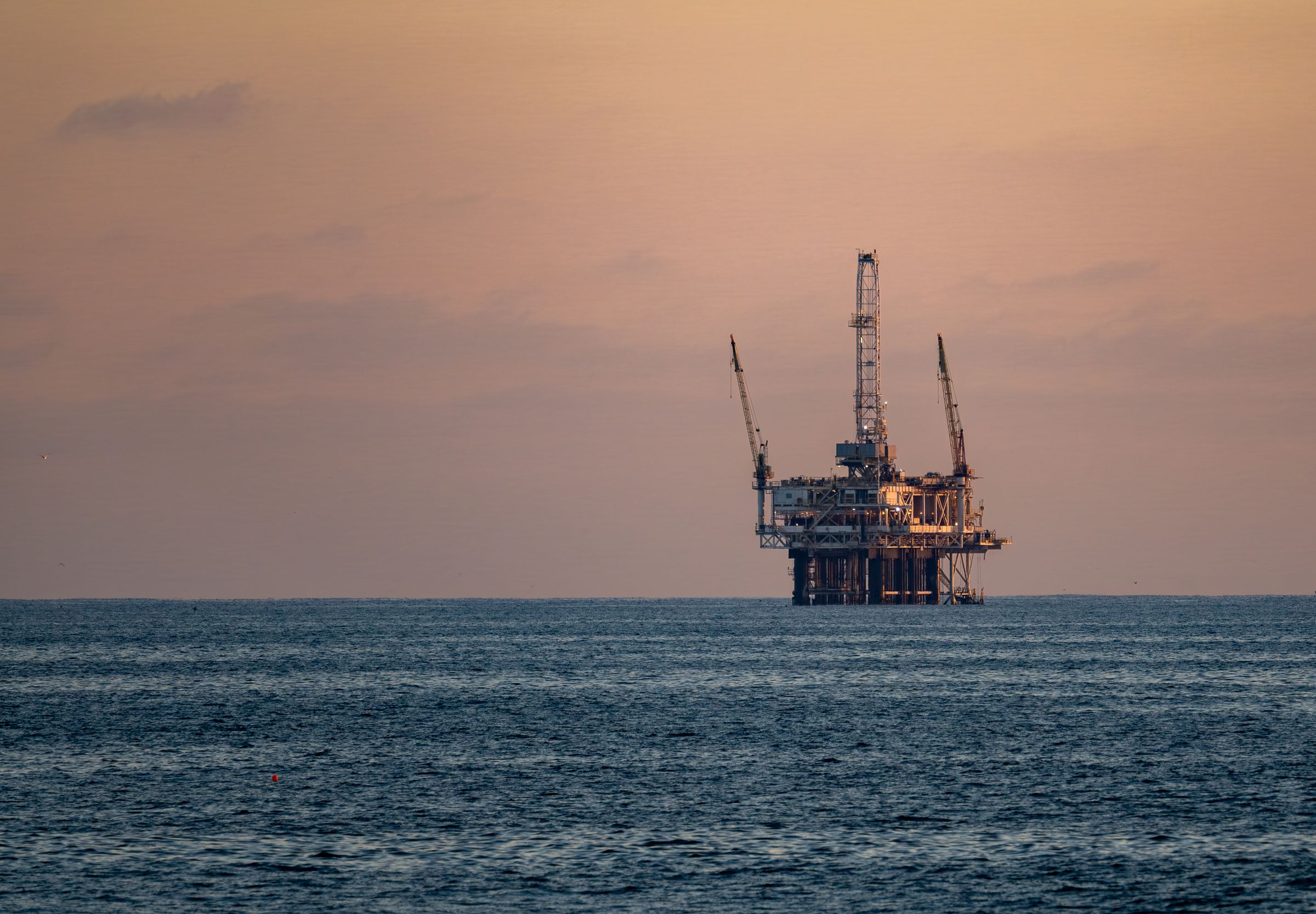 Offshore rig at sunset