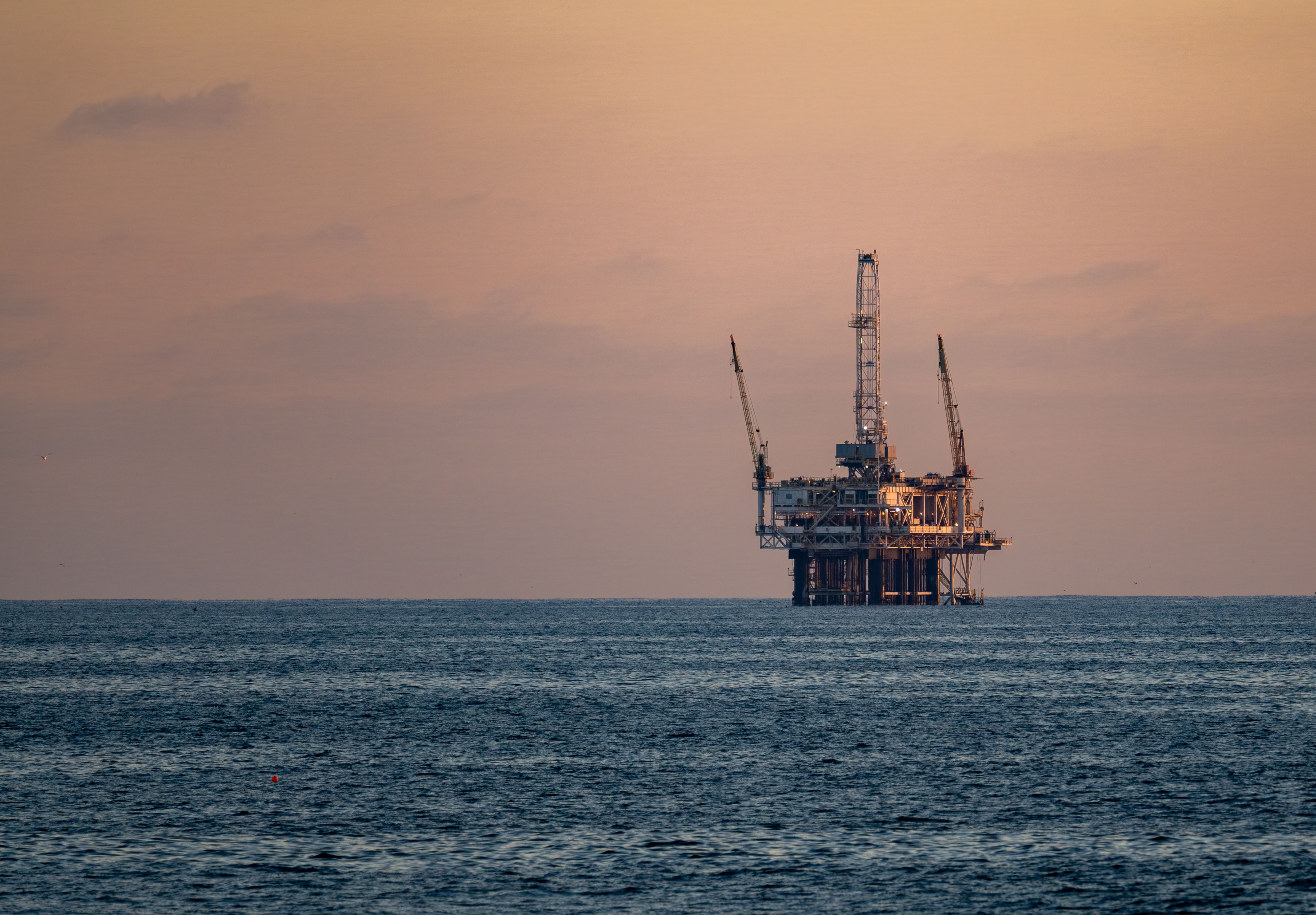 Offshore Oil Rig at Sunset in Pacific Ocean · Free Stock Photo