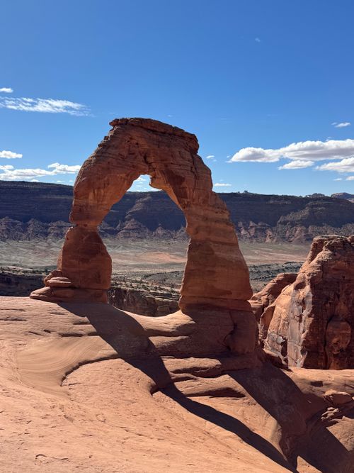 Free Stunning view of Delicate Arch under a clear blue sky in Utah's Arches National Park. Stock Photo