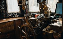 Vintage Ship Steering Wheel in Nautical Cabin