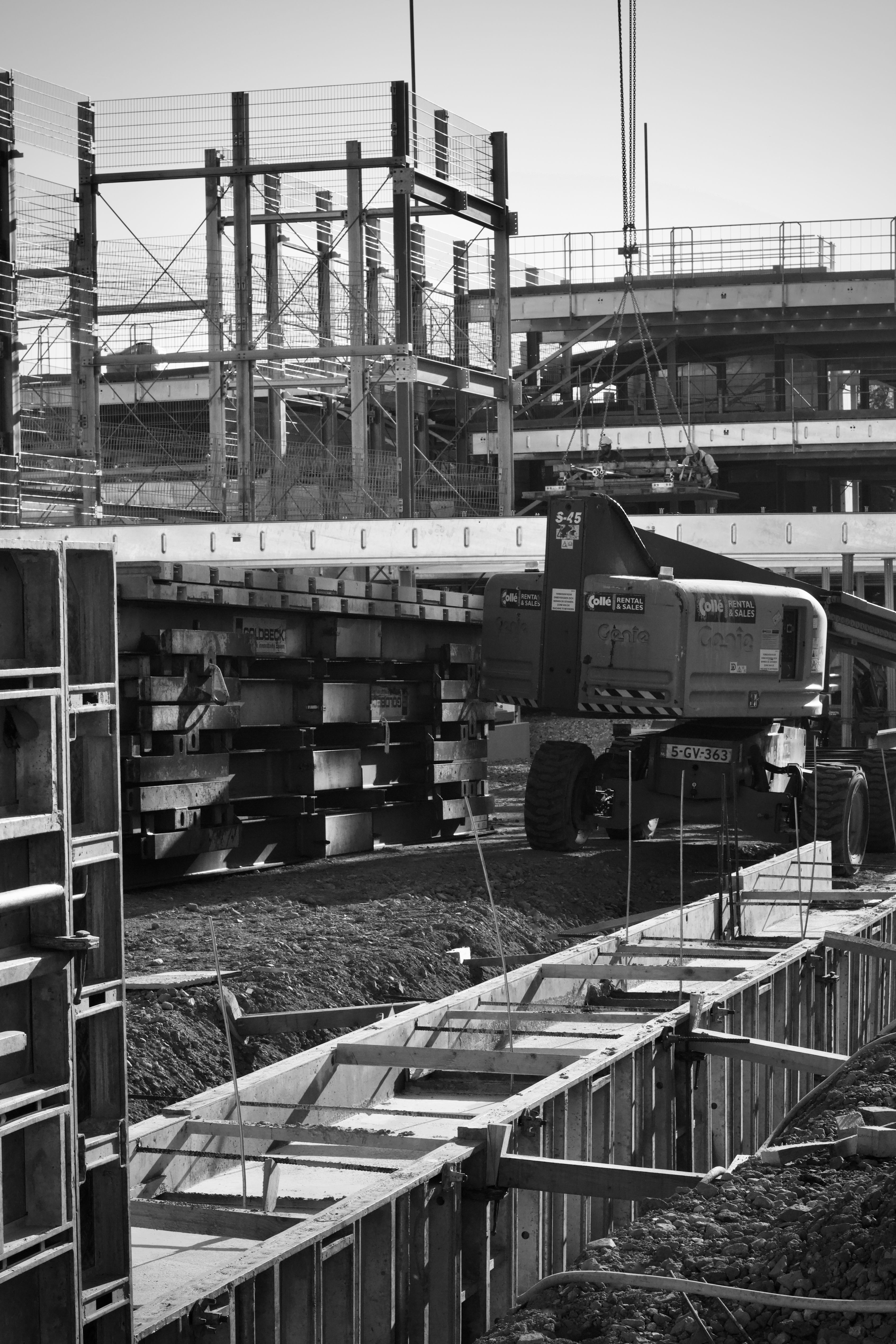 Black and White Construction Site with Machinery · Free Stock Photo