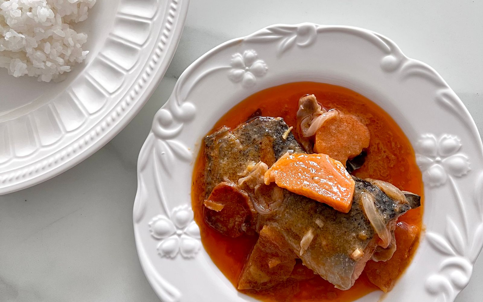 Foto de Peixe ao molho de coco com arroz branco