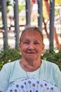 Elderly Woman Enjoying a Sunny Day Outdoors
