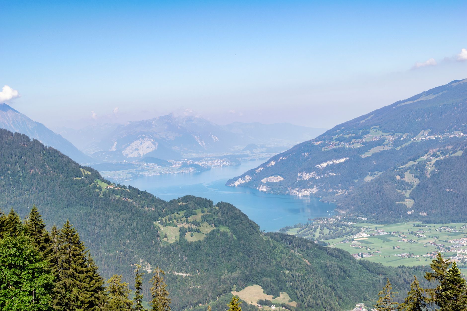 Aerial view of Lake Thun surrounded by mountains