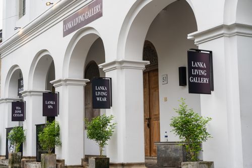 Free Charming architectural shot of Lanka Living Gallery showcasing elegant arches and greenery. Stock Photo