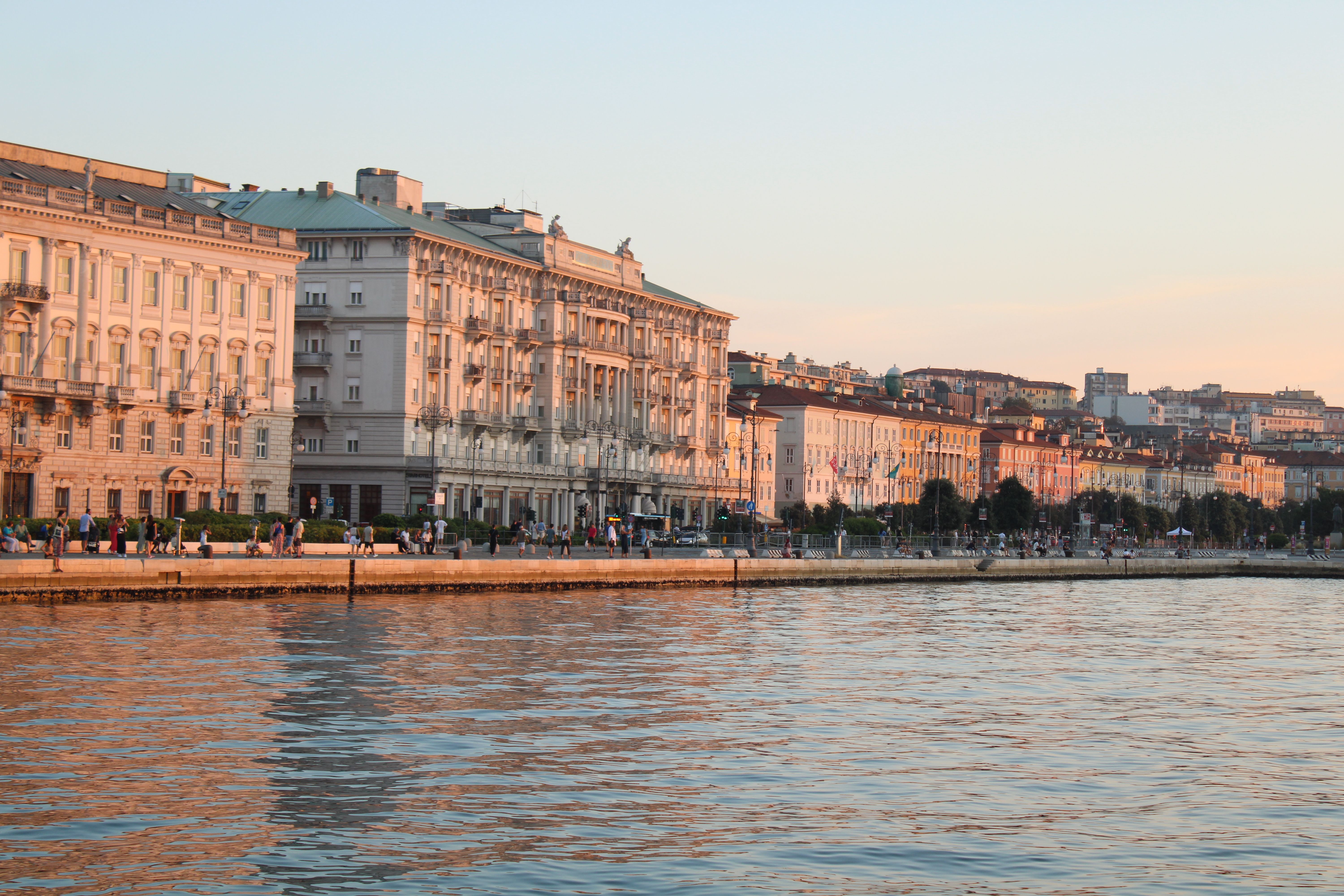 Sunset view of waterfront buildings in Trieste, Italy · Free Stock Photo