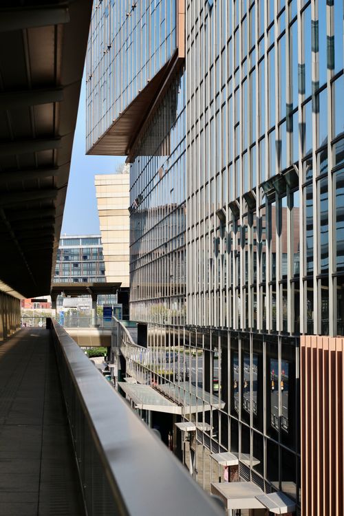 Free Dynamic perspective of a contemporary glass and steel building facade. Stock Photo
