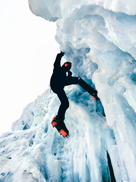Photo by Ahmet utku Deliveli on Pexels — a climber on a frozen formation