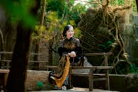 Elegant Woman in Traditional Dress Outdoors