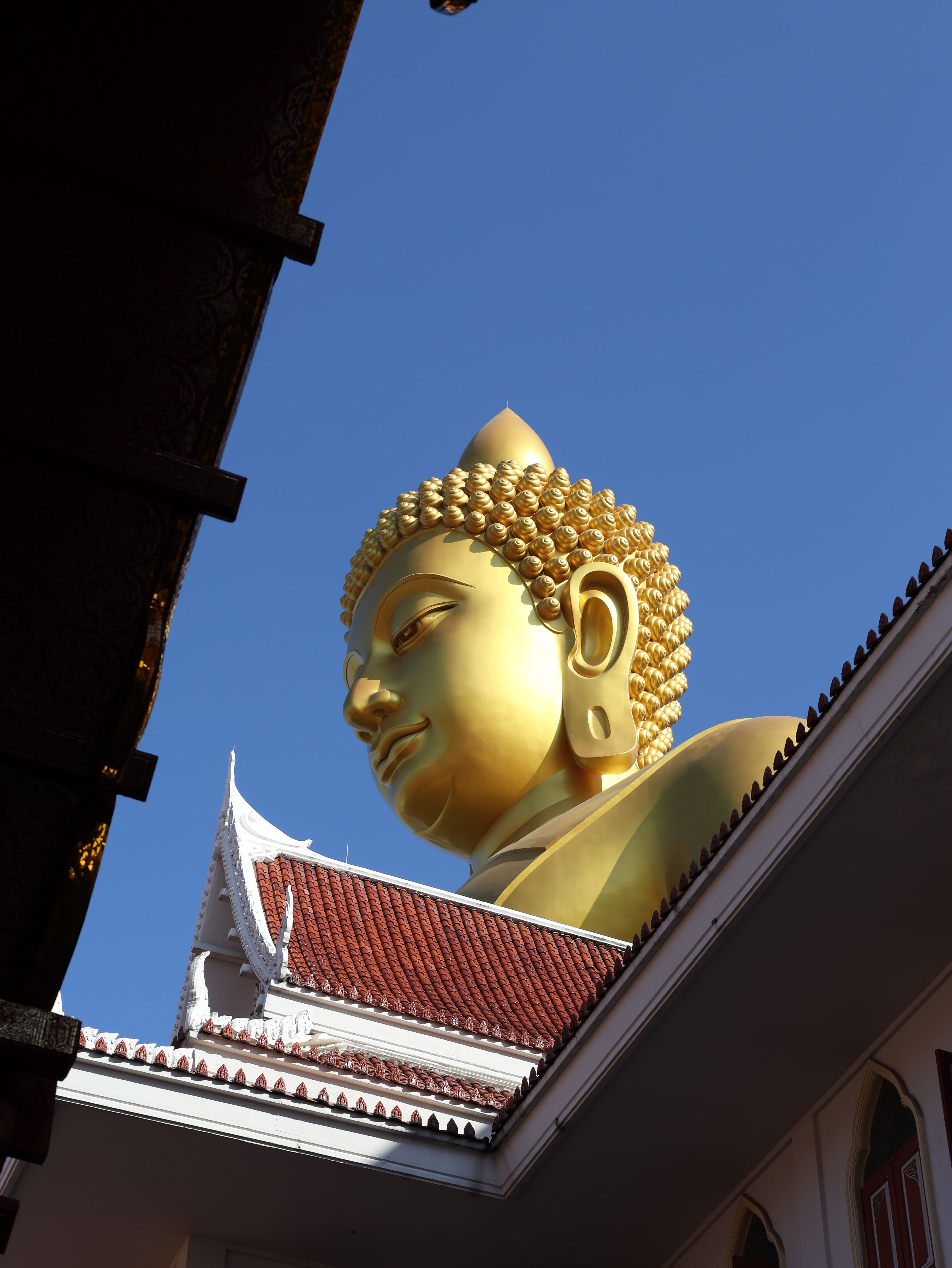 Golden Buddha Statue in Bangkok Temple Courtyard · Free Stock Photo