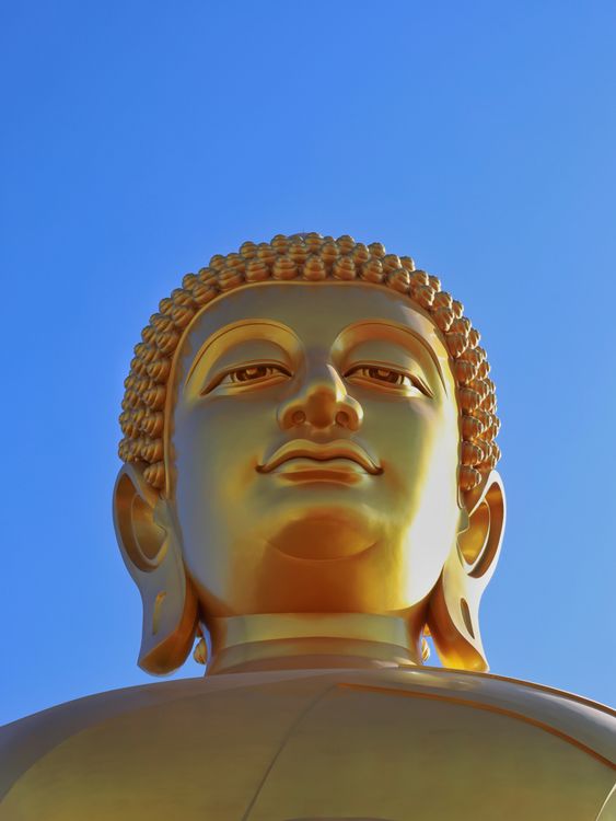 Golden Buddha Statue against Clear Blue Sky · Free Stock Photo