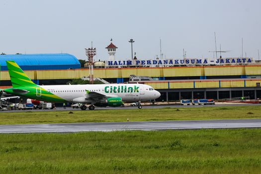 Citilink airplane taxiing at Halim Perdanakusuma Airport, Jakarta, Indonesia.