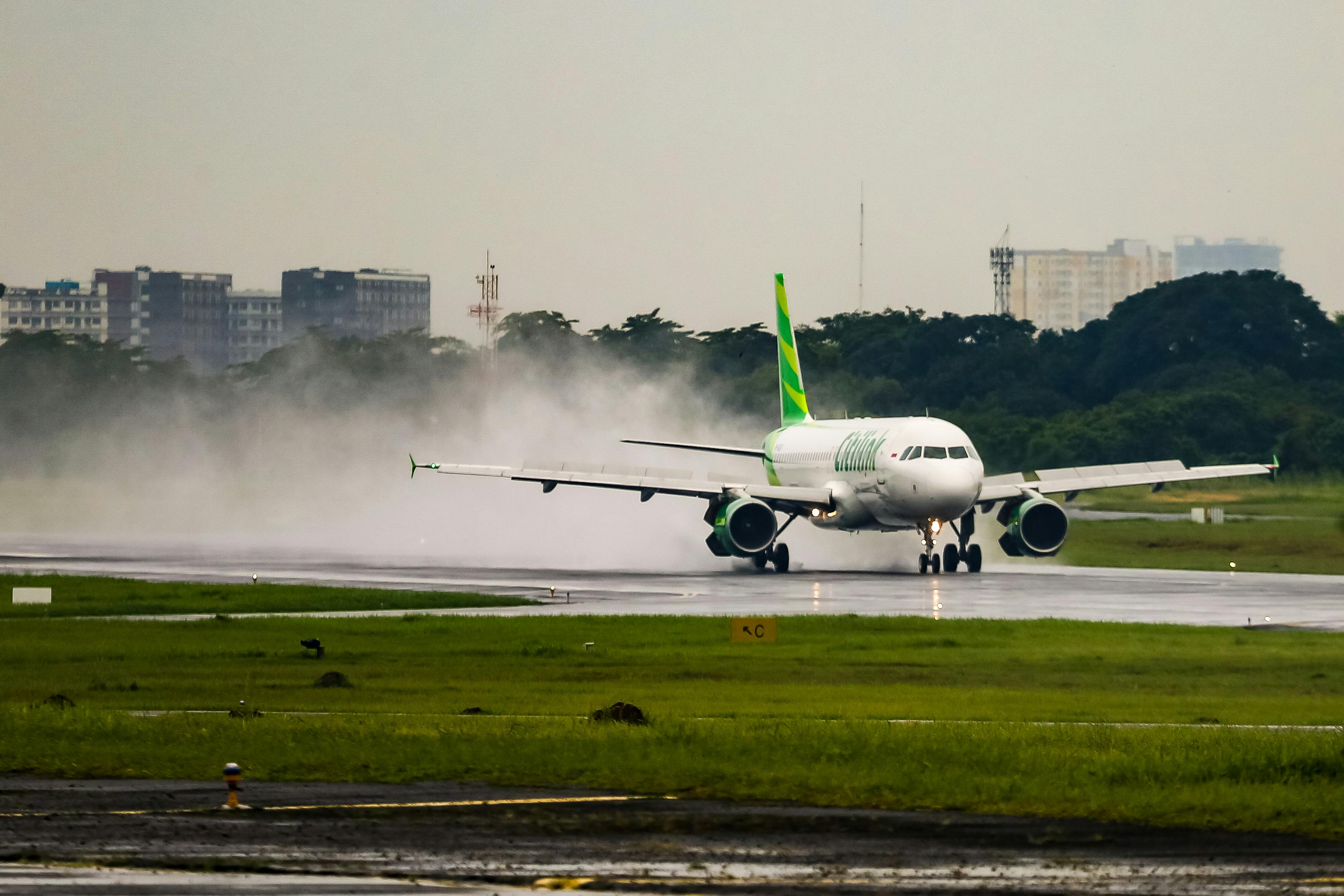 Airplane Landing on Wet Runway in Jakarta