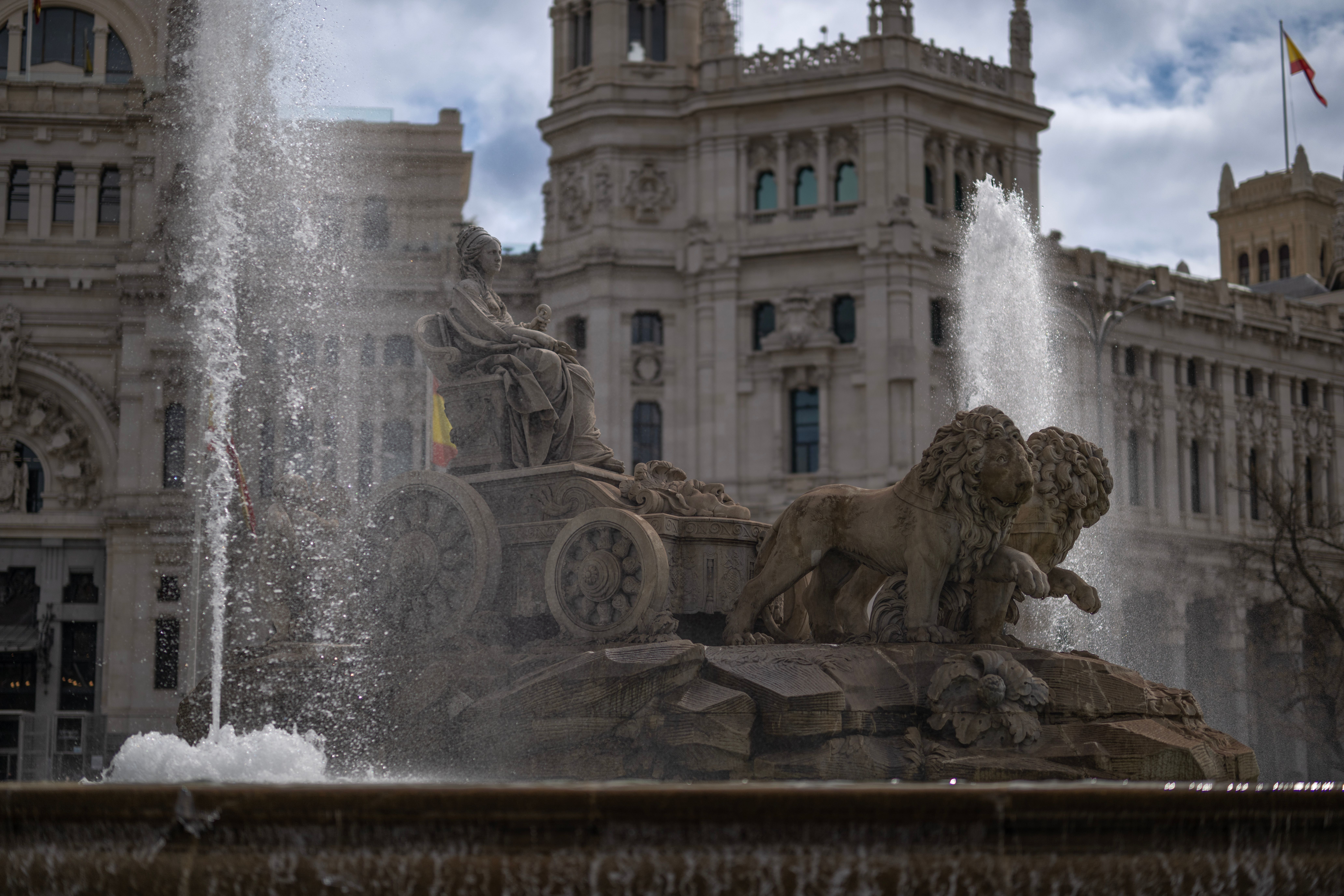 Stunning view of the iconic Cibeles Fountain in Madrid, surrounded by historic architecture.