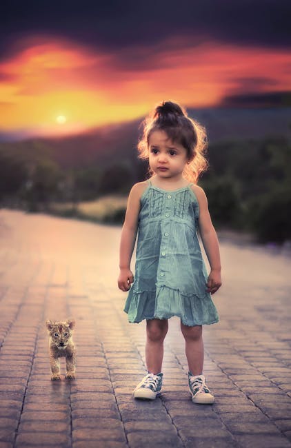 Toddler Girl Standing Beside Lion Cub  Free Stock Photo-9023