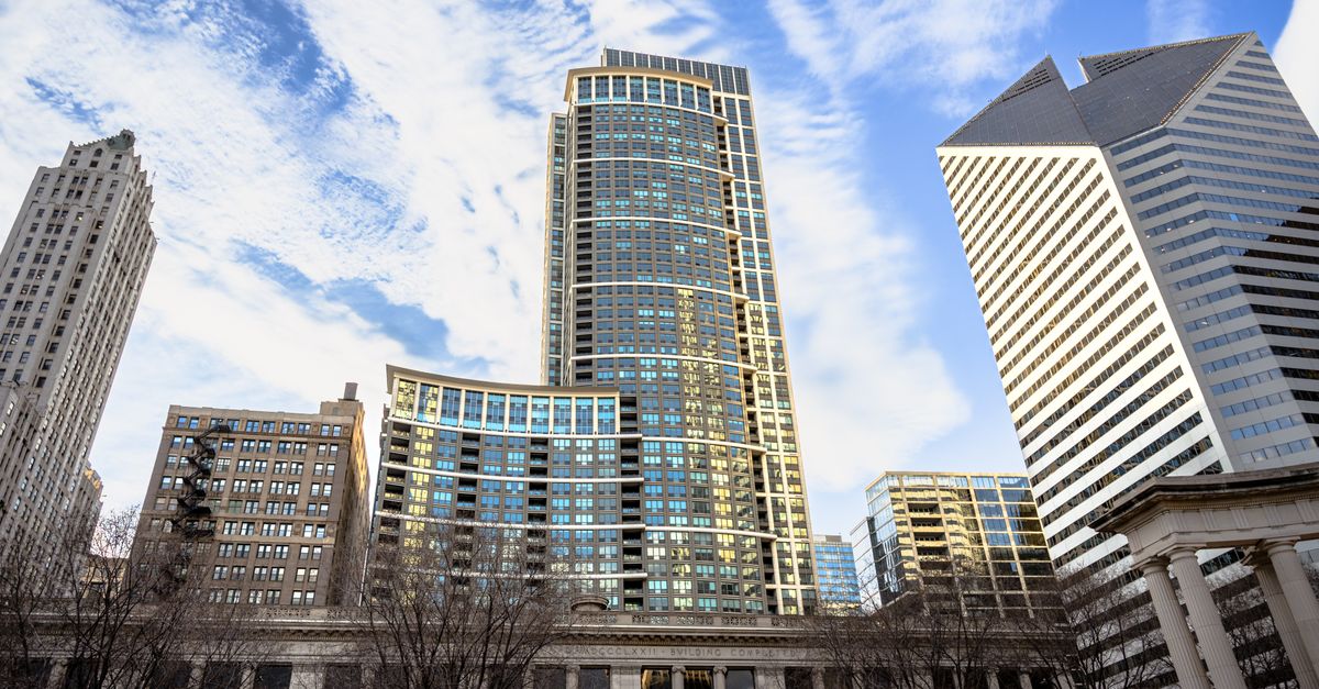 A captivating view of the Chicago skyline showcasing modern skyscrapers against a vivid blue sky.