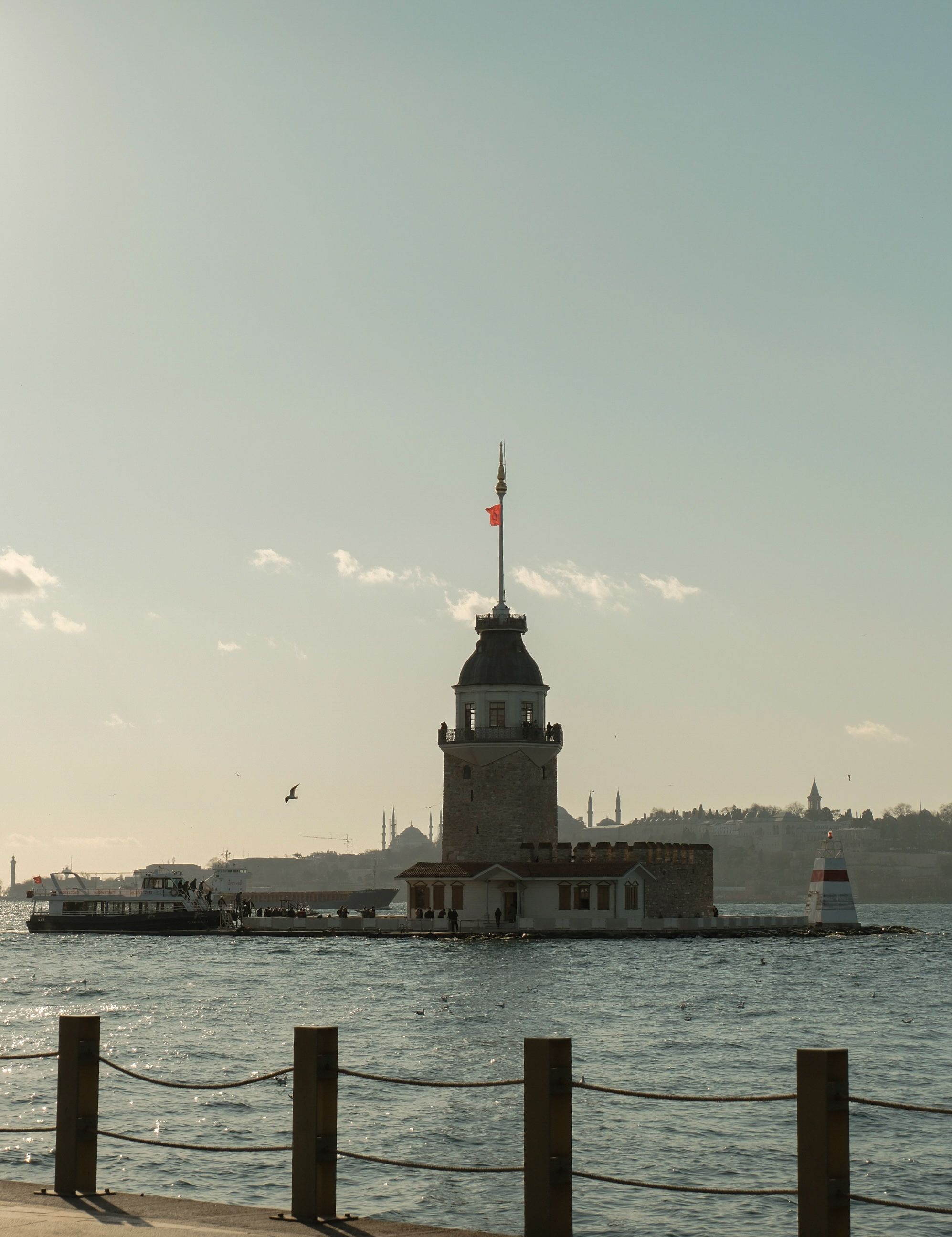 Kiz Kulesi behind Railing on Coast in Istanbul · Free Stock Photo