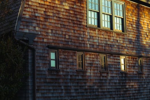 Traditional home with natural cedar wood siding, showcasing timeless curb appeal and durable exterior craftsmanship.