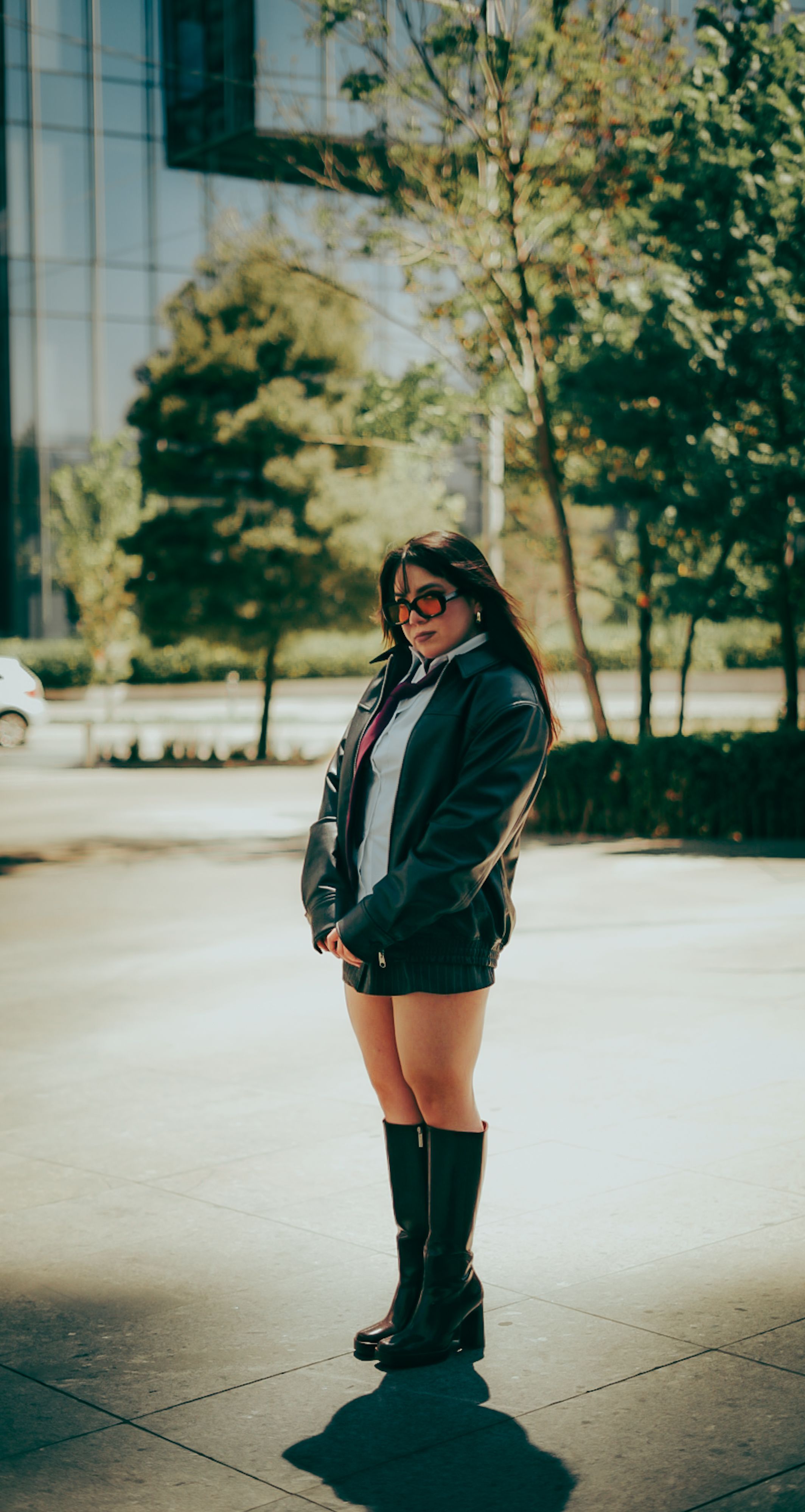 Young Woman Posing Outdoors in Urban Setting · Free Stock Photo