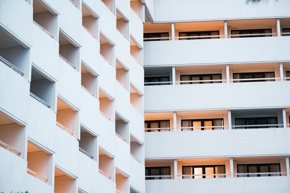Elegant hotel facade showcasing modern architecture in Bali, Indonesia at dusk.