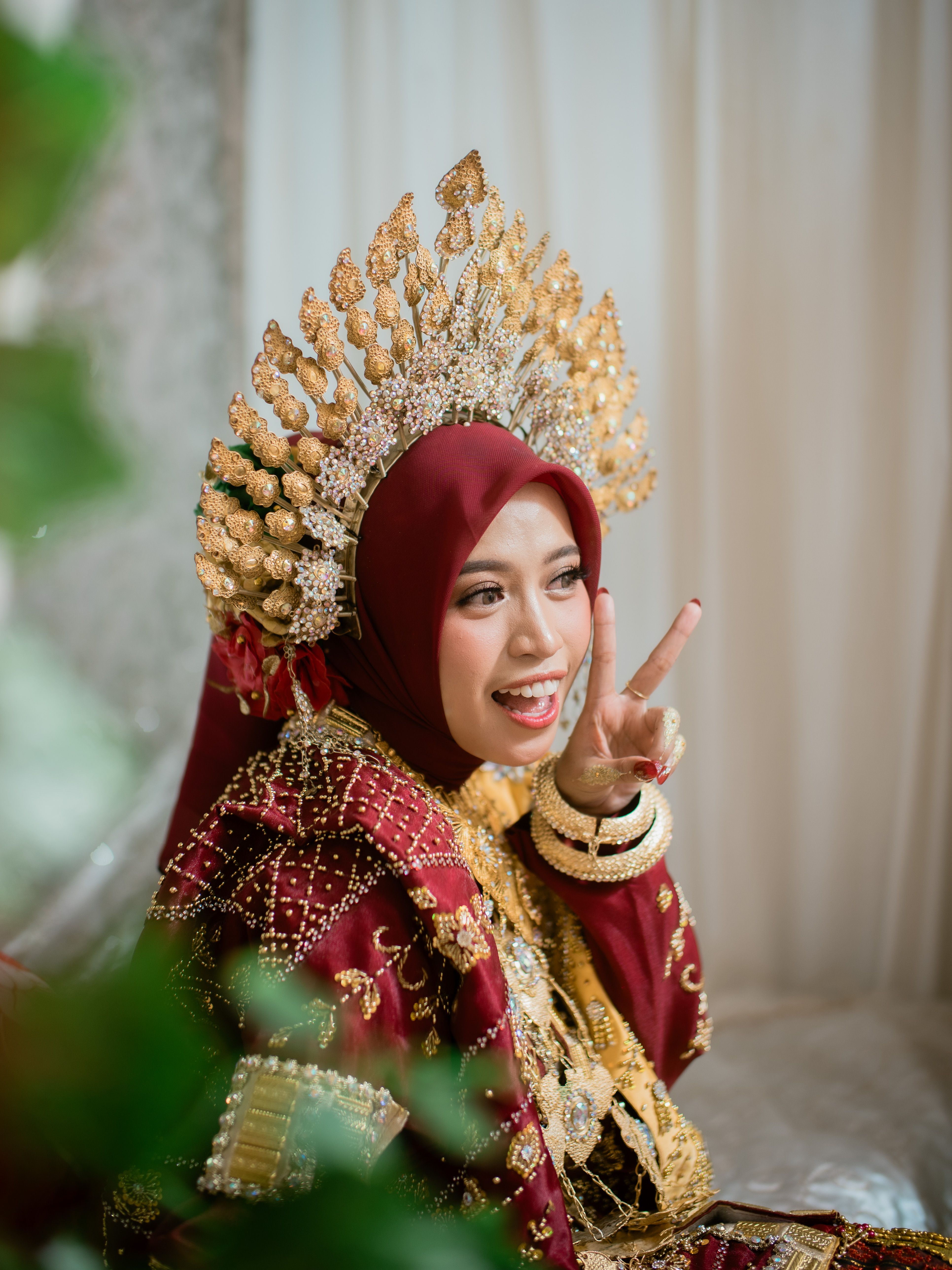 Traditional Bugis Bride in Elegant Red Attire · Free Stock Photo