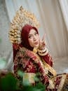 Traditional Bugis Bride in Elegant Red Attire