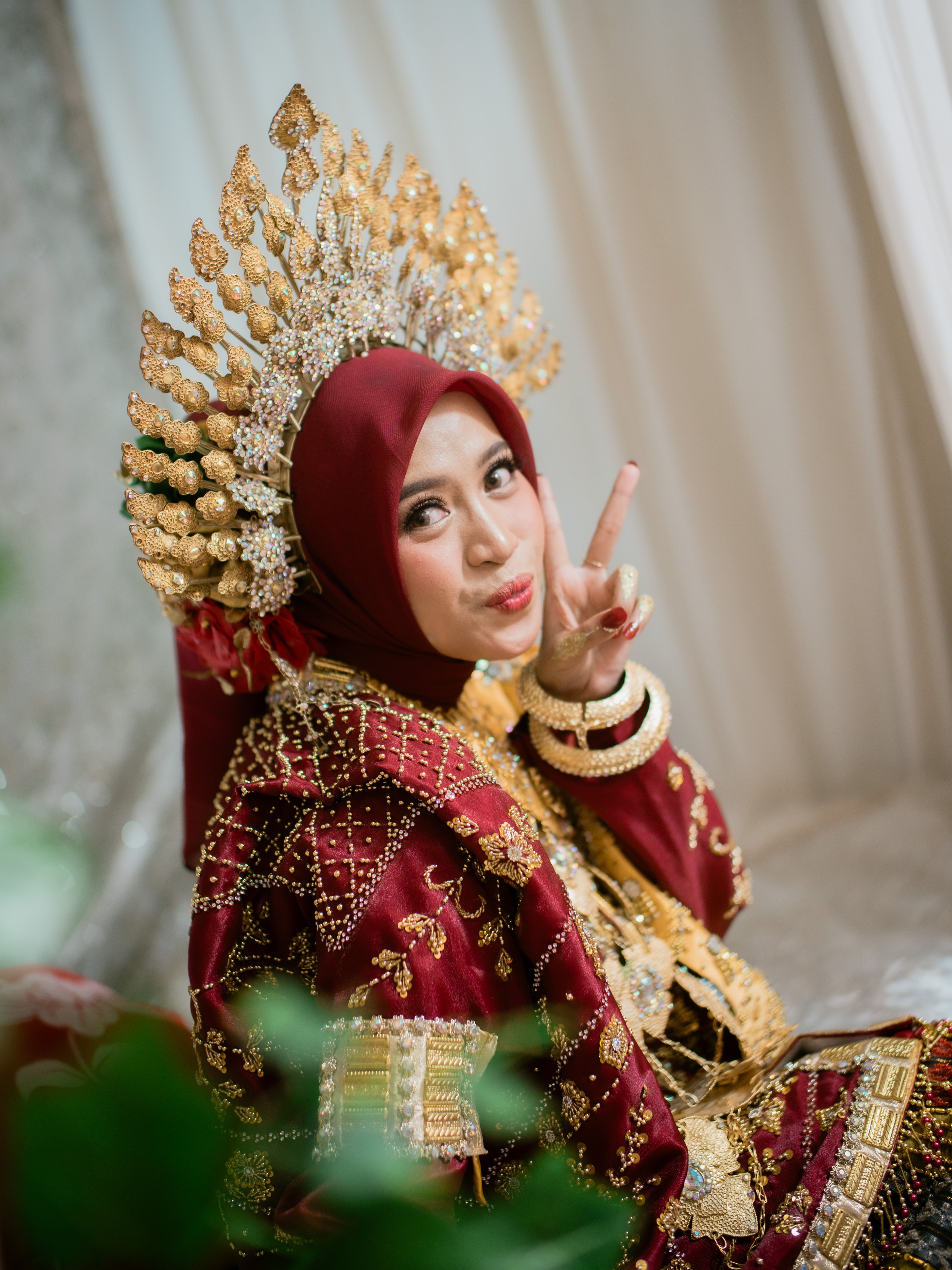 Traditional Bugis Bride in Elegant Red Attire · Free Stock Photo