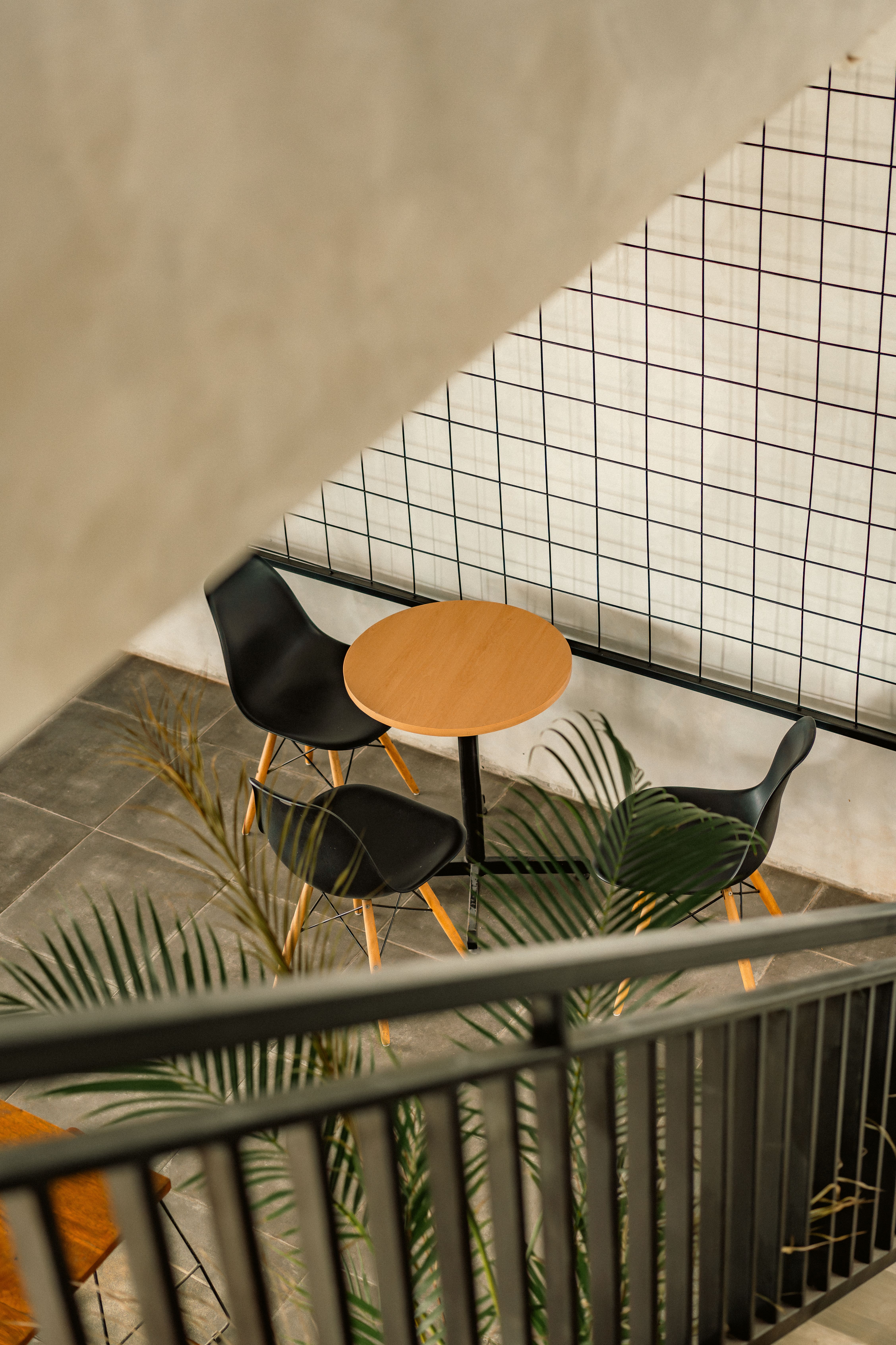 Modern Cafe Seating Area Viewed from Above · Free Stock Photo