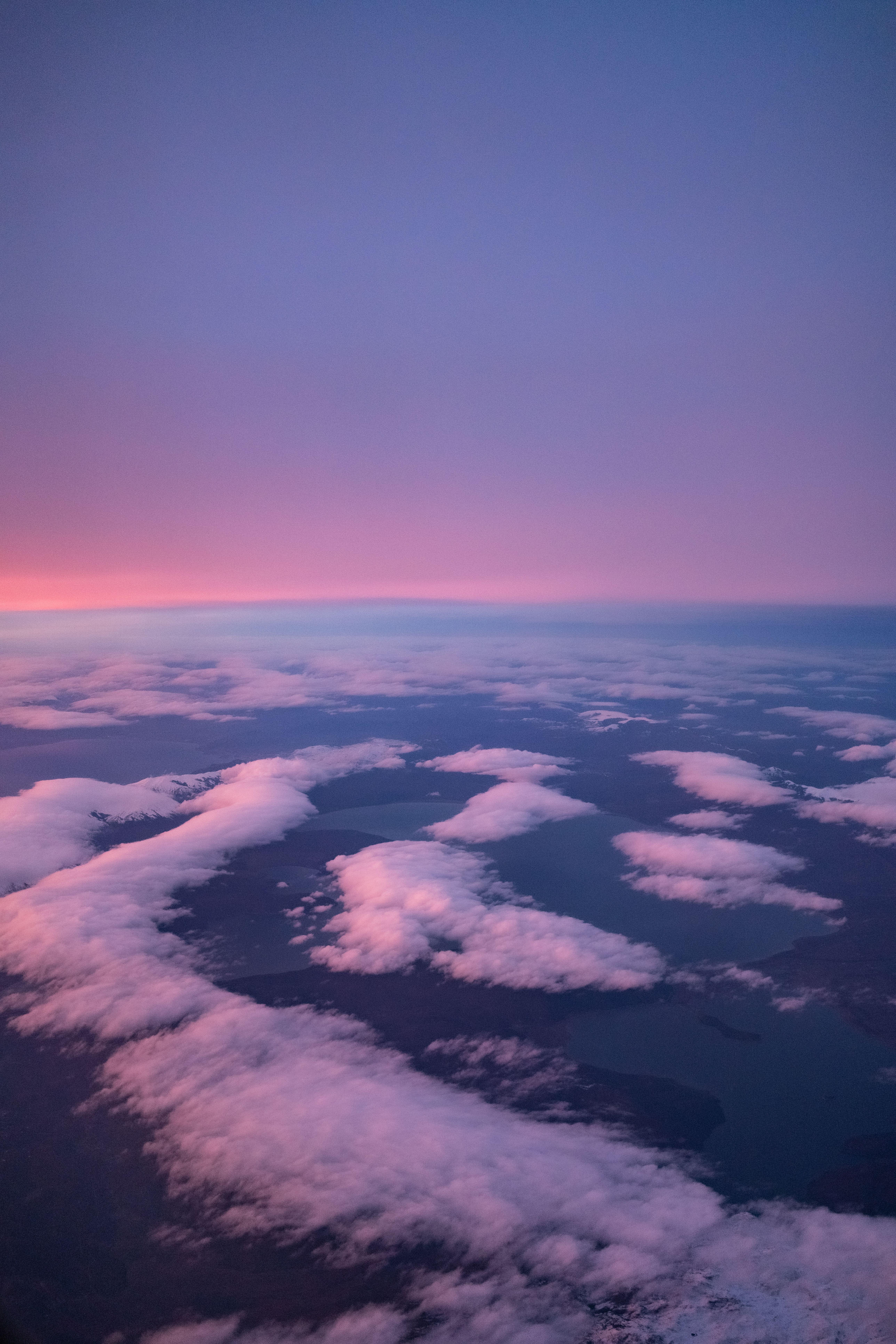 Stunning aerial view of fluffy clouds at sunset over Istanbul, Türkiye