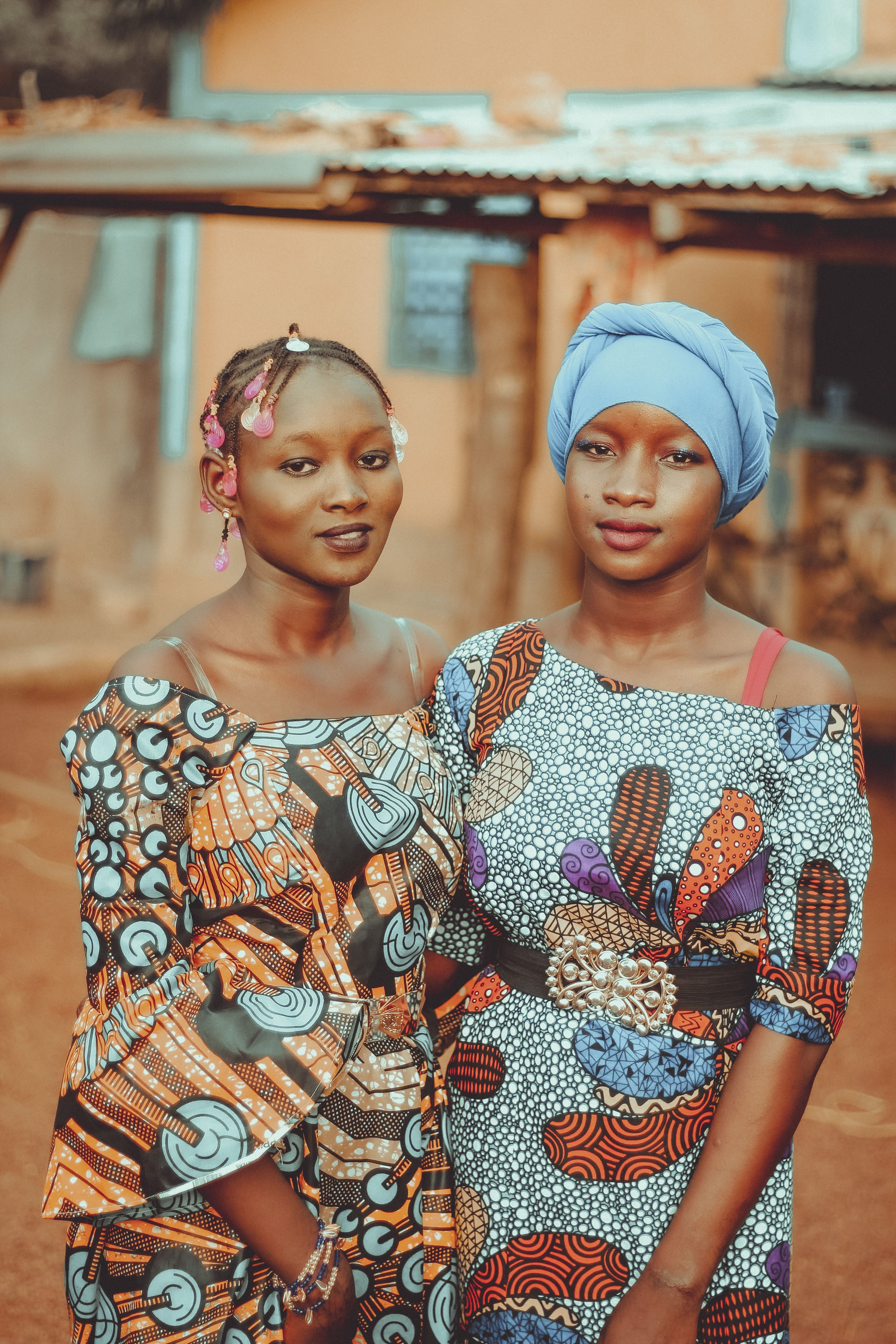 Portrait of Two Women in Vibrant African Attire · Free Stock Photo