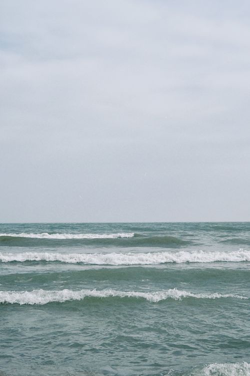 Free Peaceful ocean waves on a cloudy day at Konaev, Almaty Region, Kazakhstan. Stock Photo