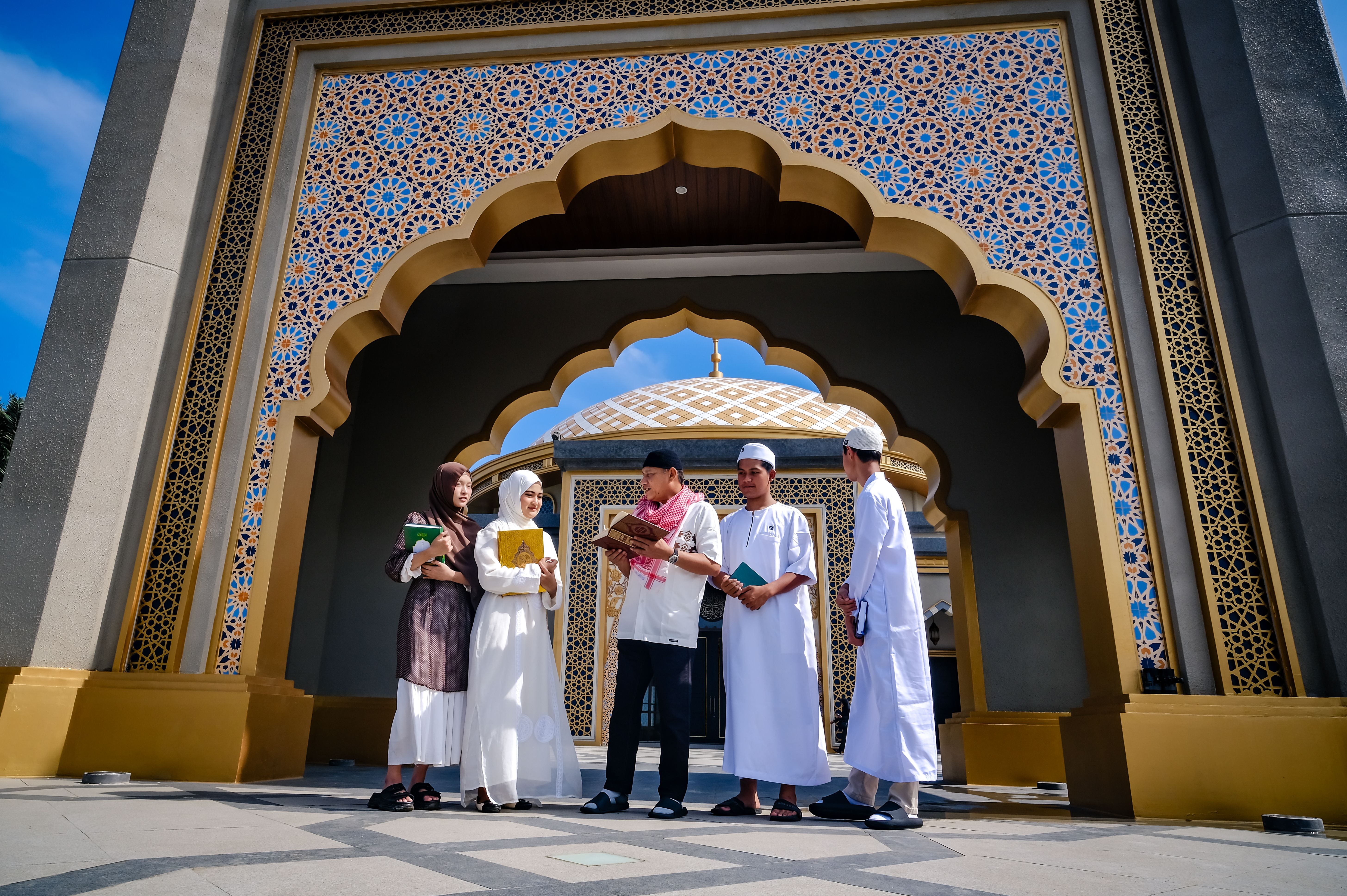 Group of Young Muslims in Traditional Attire · Free Stock Photo
