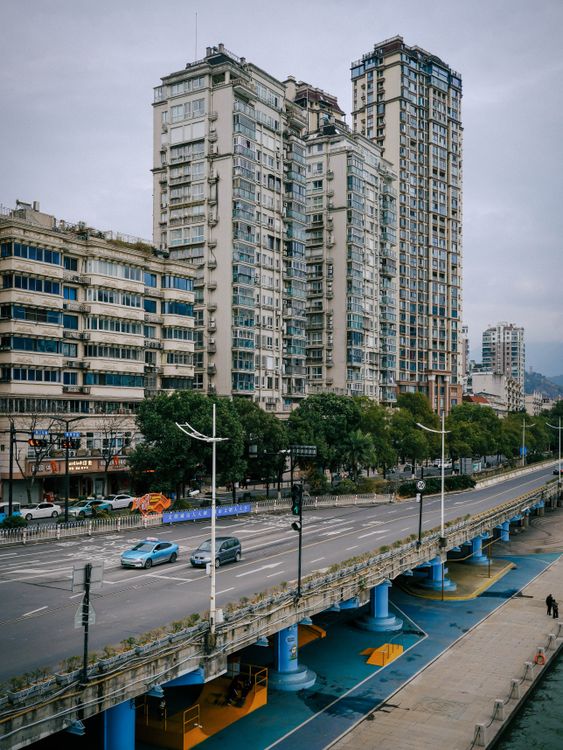 Cityscape with High-Rise Buildings and Elevated Road · Free Stock Photo