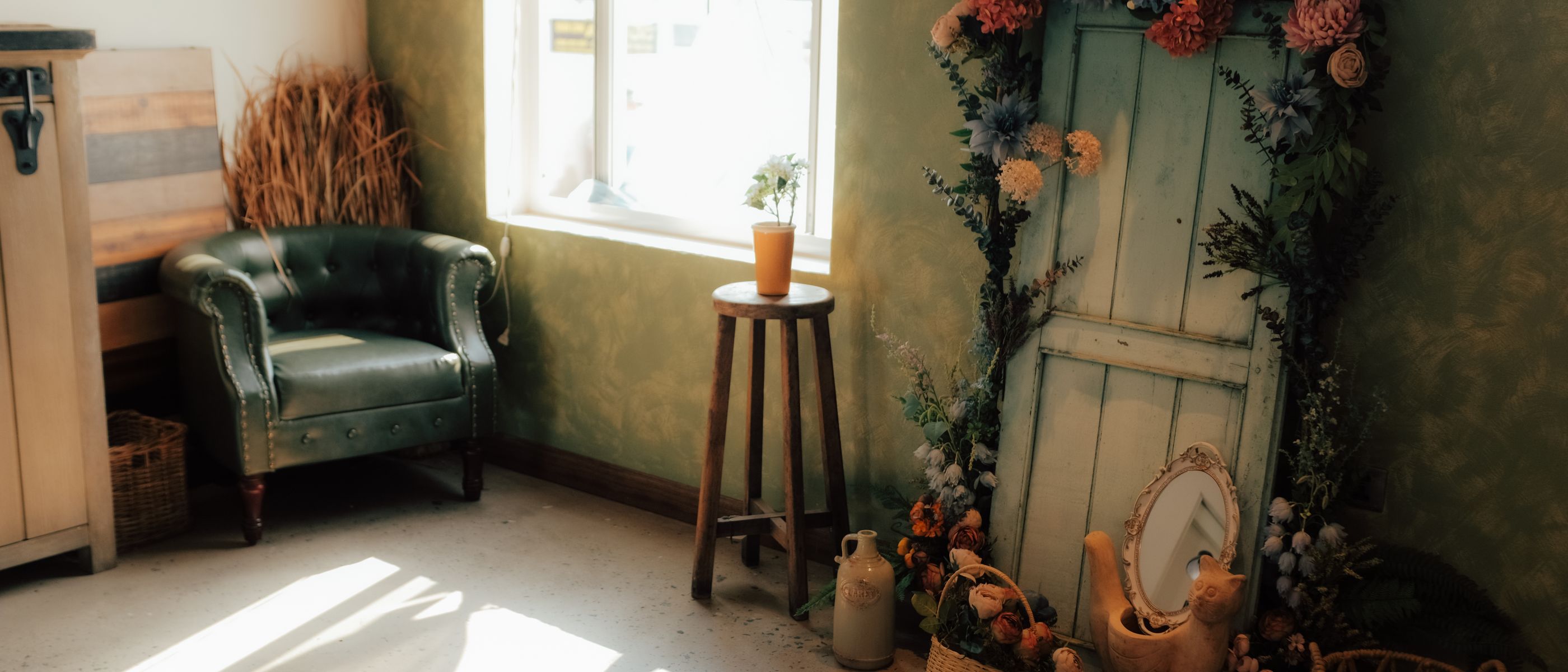 Wallpapering in Seven Sisters — clean edges cut in around trim and sockets