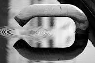 Monochrome Abstract Reflection with Pipe and Ripples