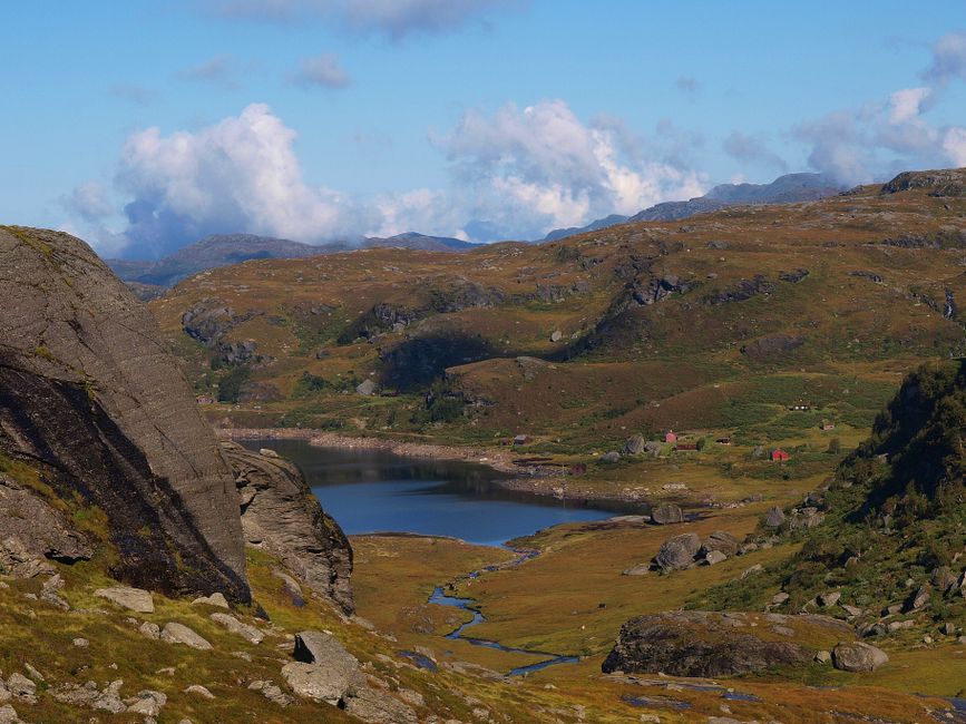 Amazing Northern Lights Expedition Tromsø - 6 People - Arctic Photo Guide Review 2026 - Discover the breathtaking mountain and lake landscape in Etne, Vestland, Norway surrounded by clear skies and vibrant autumn colors.