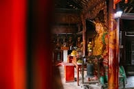 Intricate Temple Interior with Vibrant Statue