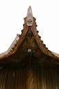 Intricate Wooden Temple Roof with Ornamental Features